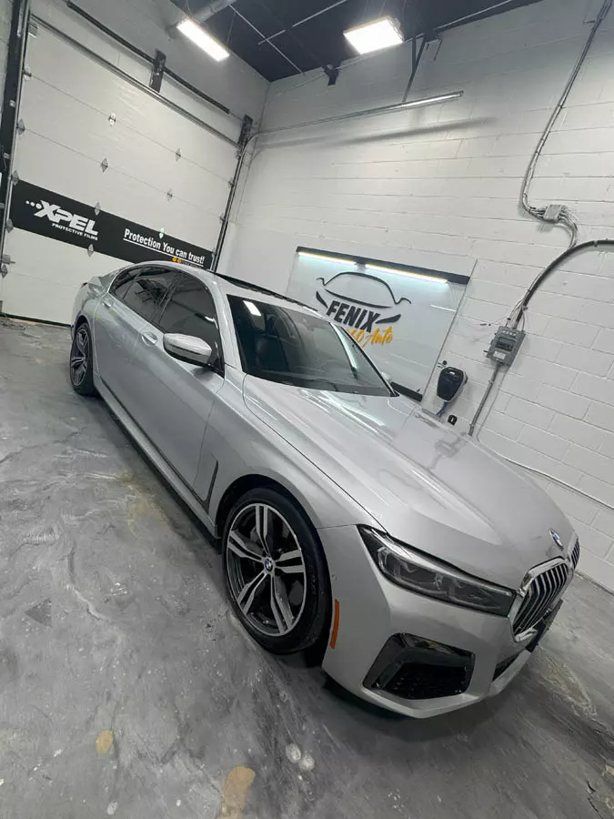 Ceramic window film installation on luxury car in Hamilton